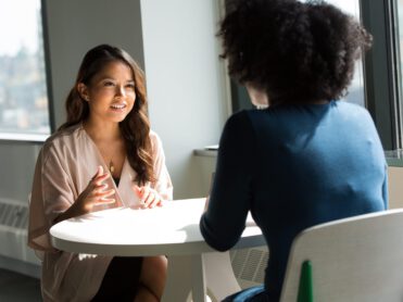 conversation between two female coworkers